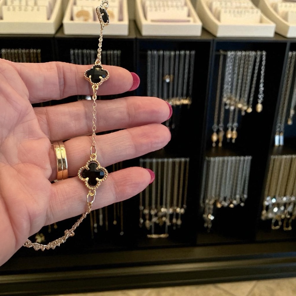 Elegant Black and Gold Clover Bracelet NWT